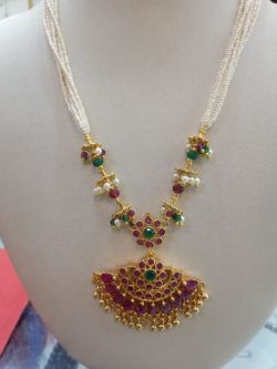 5. Beautiful necklace with art ruby and green stones